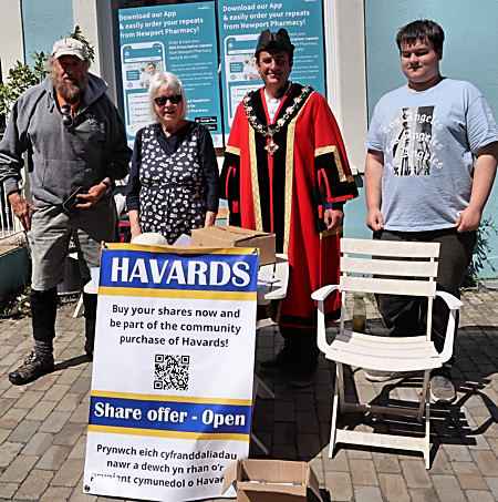 Volunteers and Mayor at a street stall